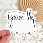 You're The Tits encouraging typography sticker. Funny boobs play on words for inspiration or as a great gift to show someone how awesome they are. A reminder of self love sticker. Original Teluna design dishwasher safe.